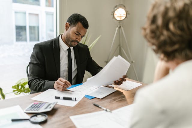 property-manager-and-client-at-desk